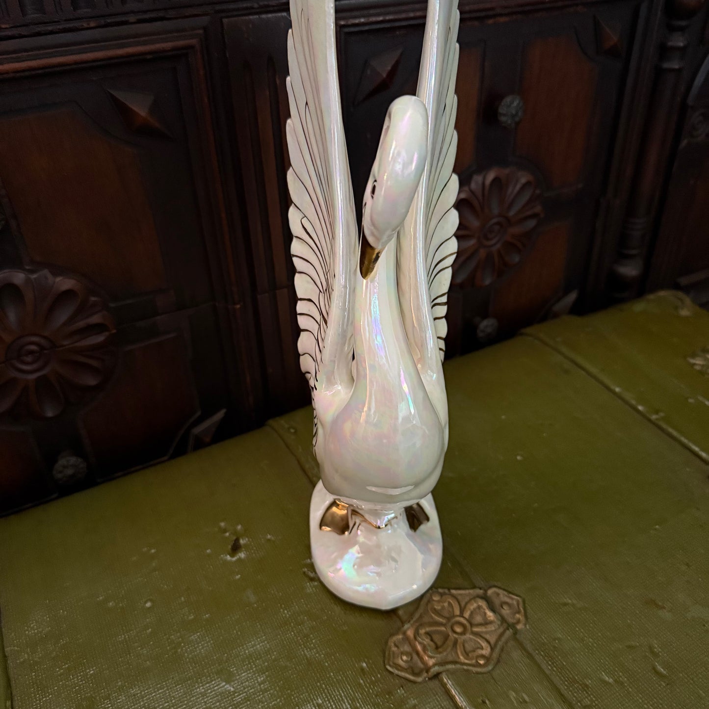 iridescent swan statue