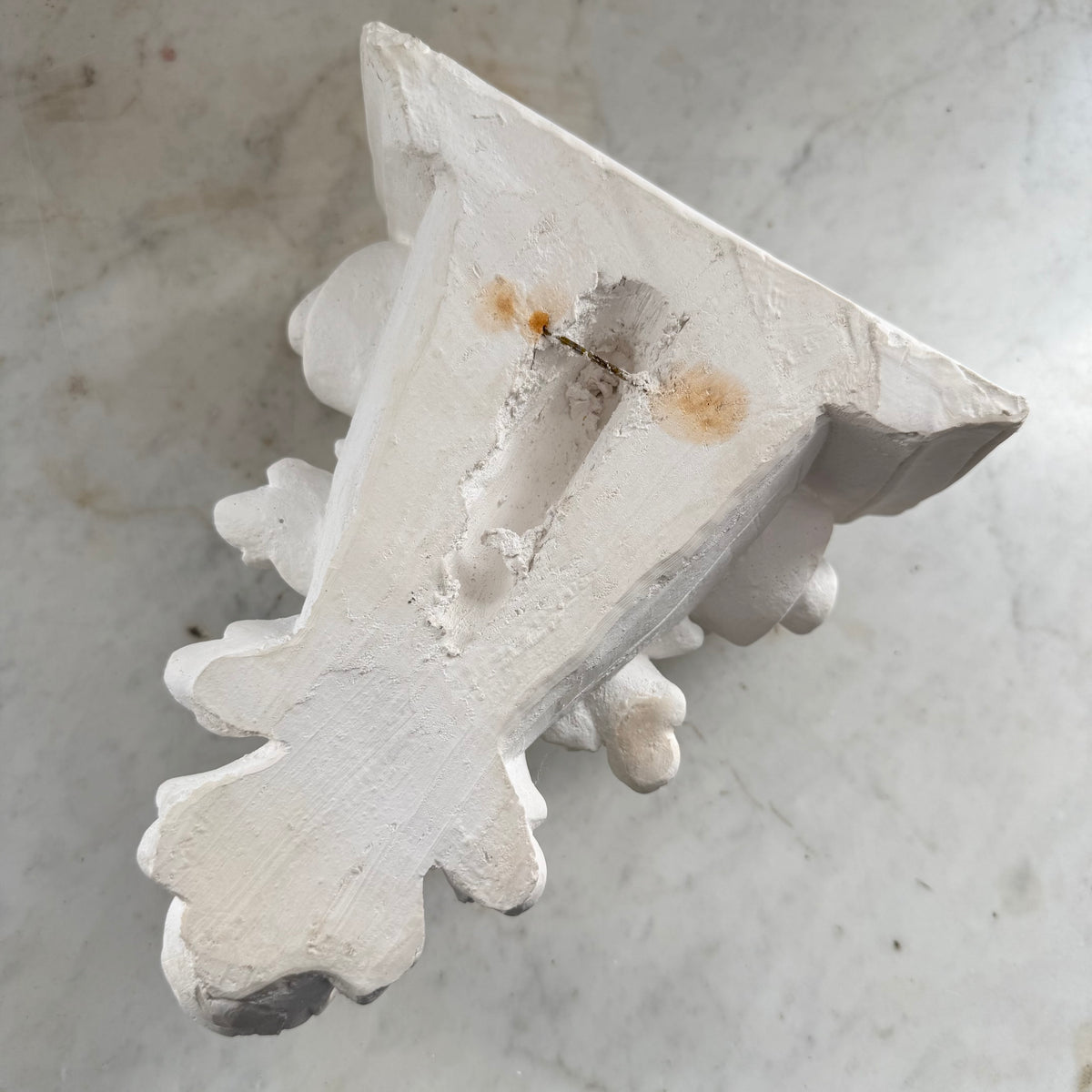 white corbel shelf