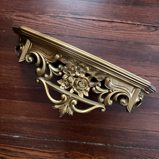 gold floral wall shelf