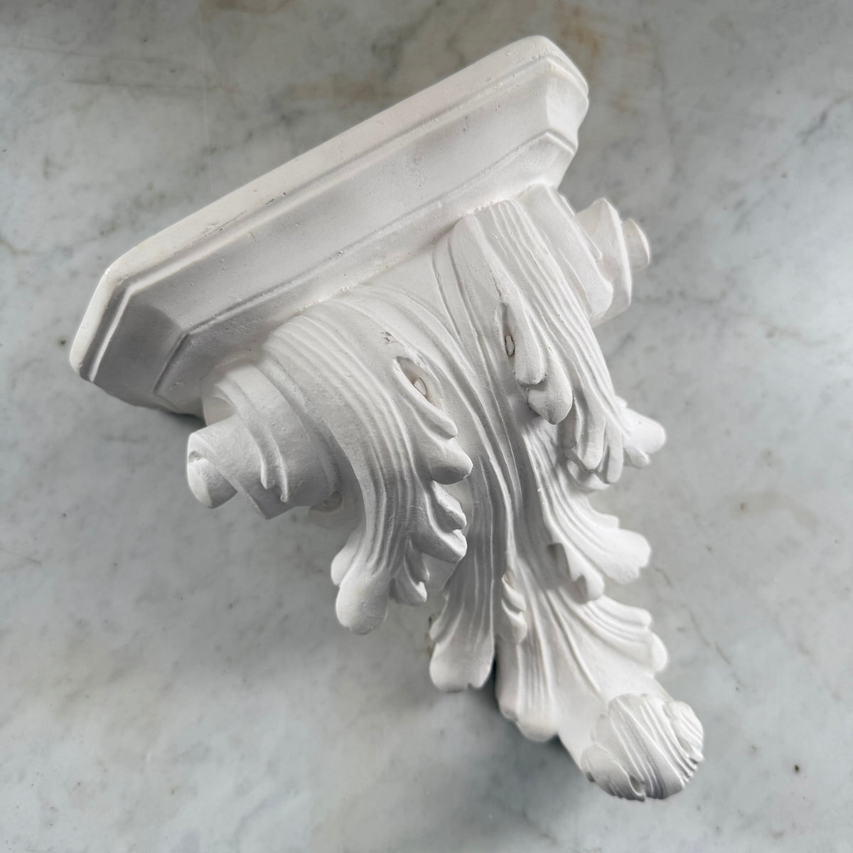 white corbel shelf