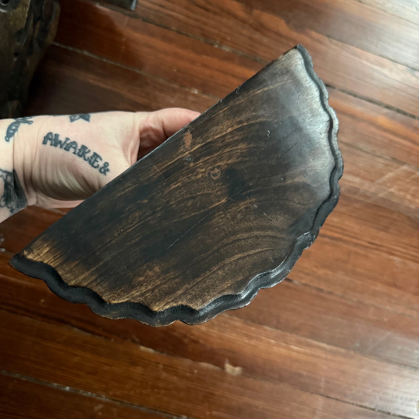 pair of carved wood wall shelves
