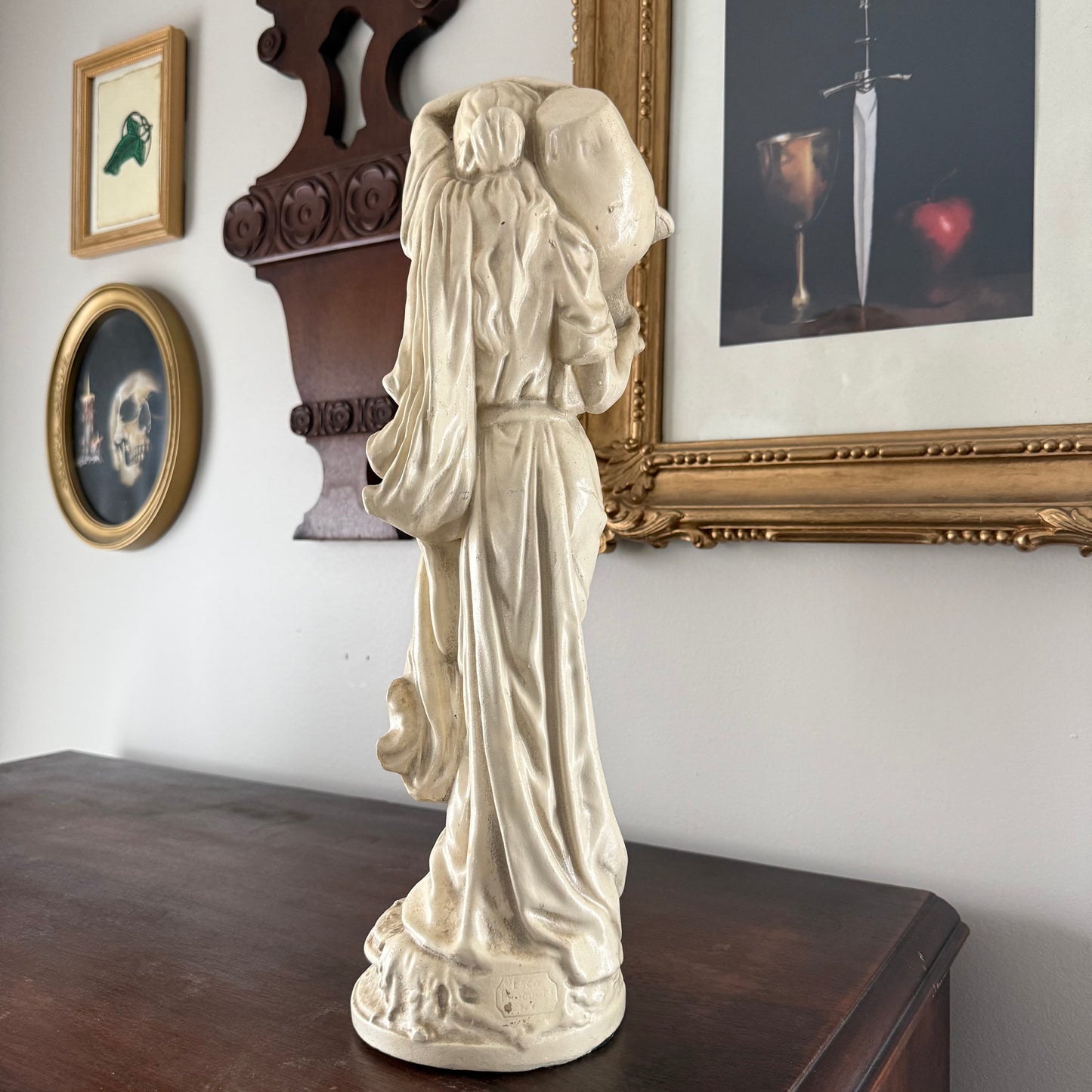 vintage aquarius water bearer statue