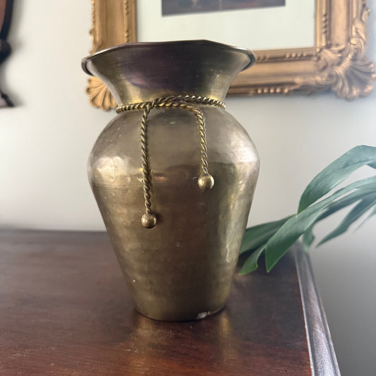 brass vase with rope