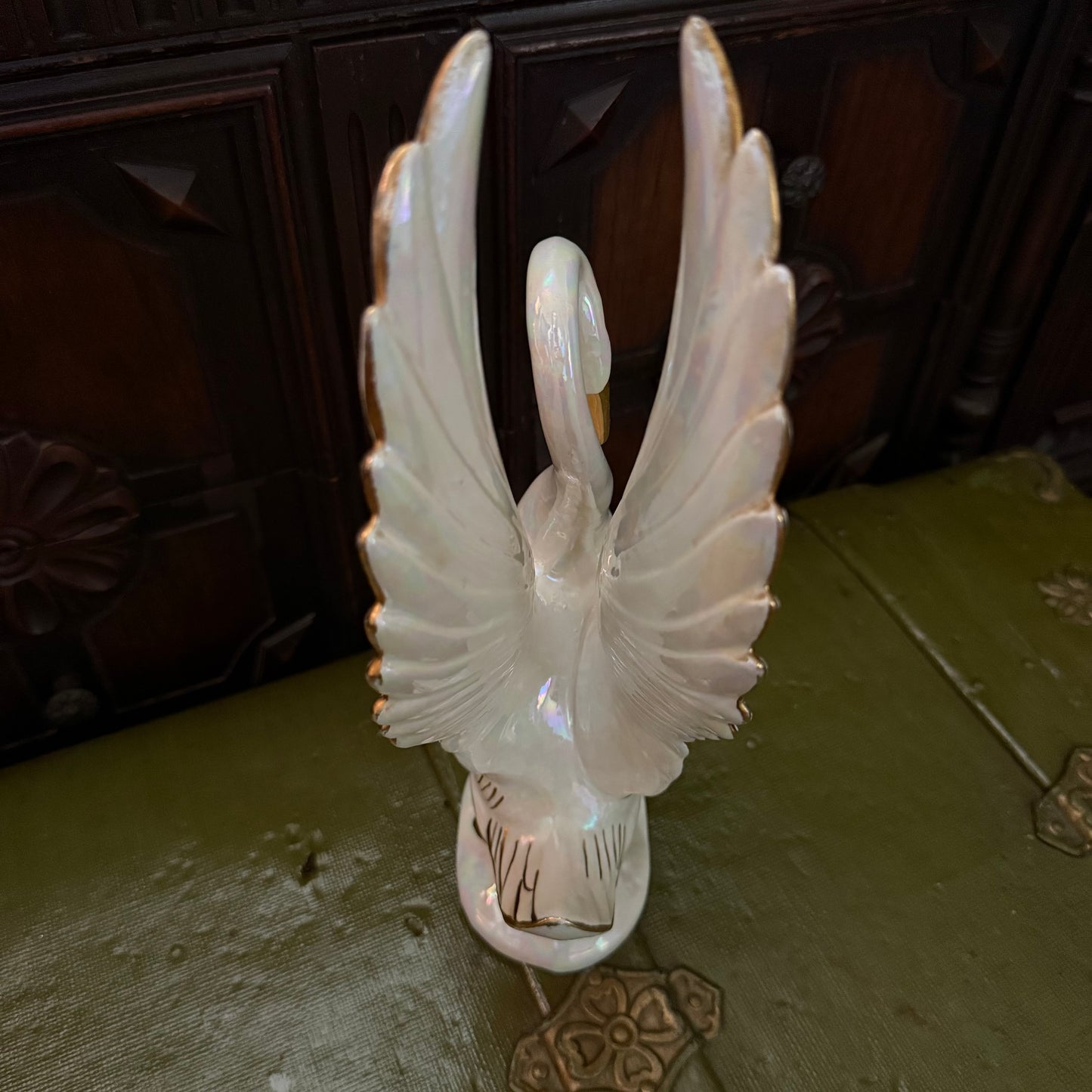 iridescent swan statue