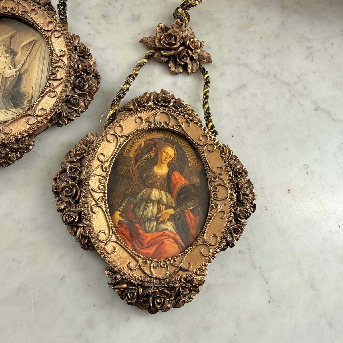 pair of ornate resin frames
