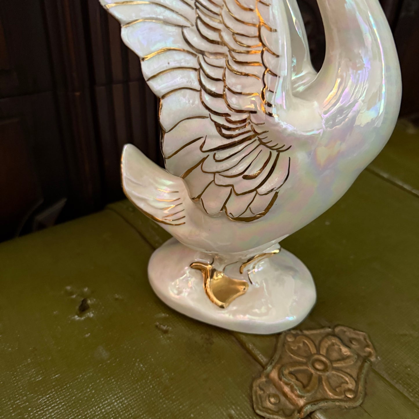 iridescent swan statue