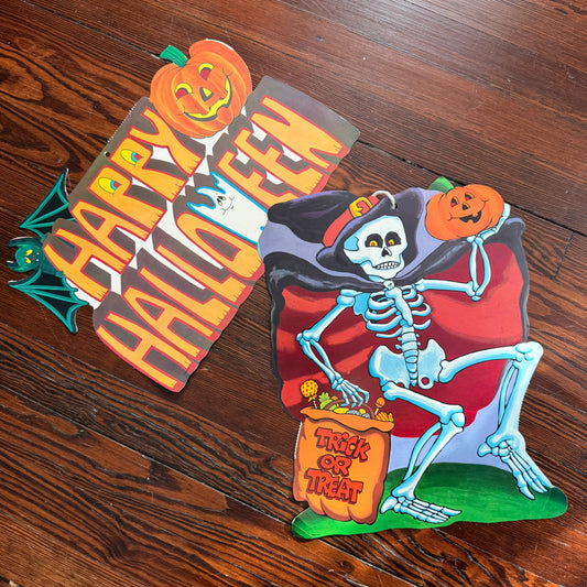 pair of vintage die cuts