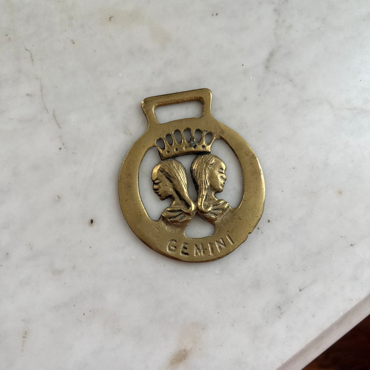 brass gemini medallion