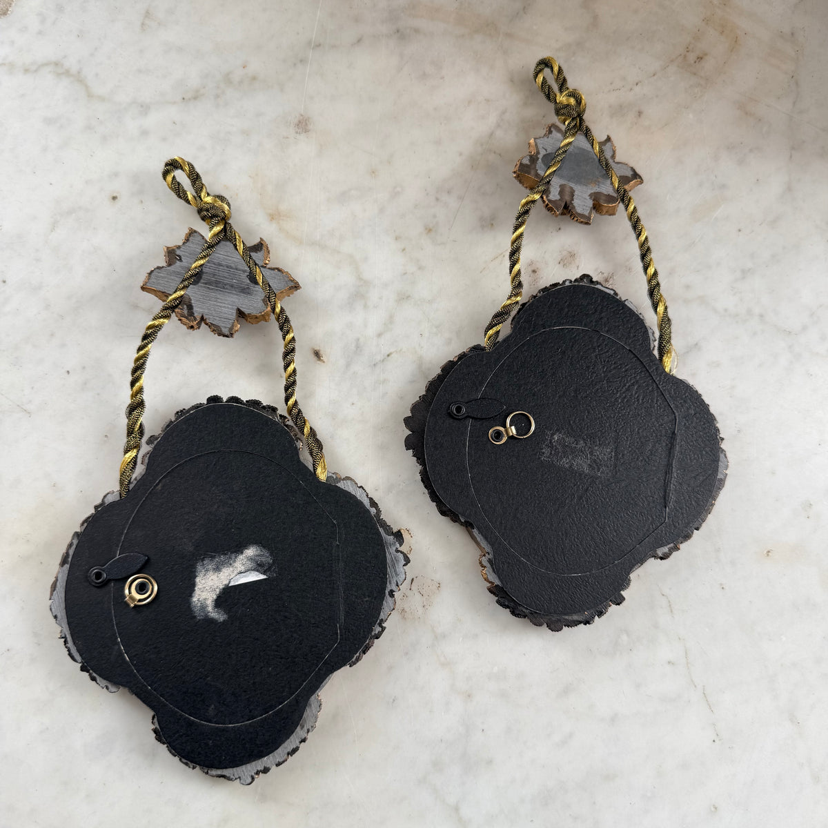 pair of ornate resin frames