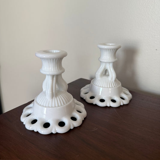 pair of milk glass candle sticks
