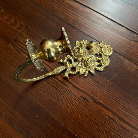 brass floral candle sconce
