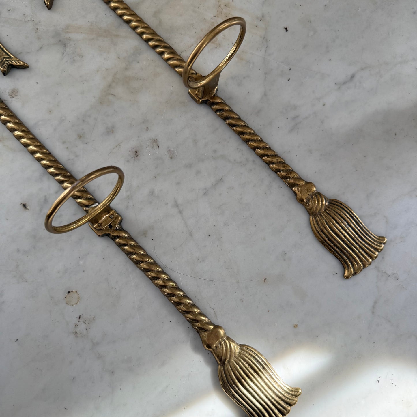 pair of brass bow vase holders