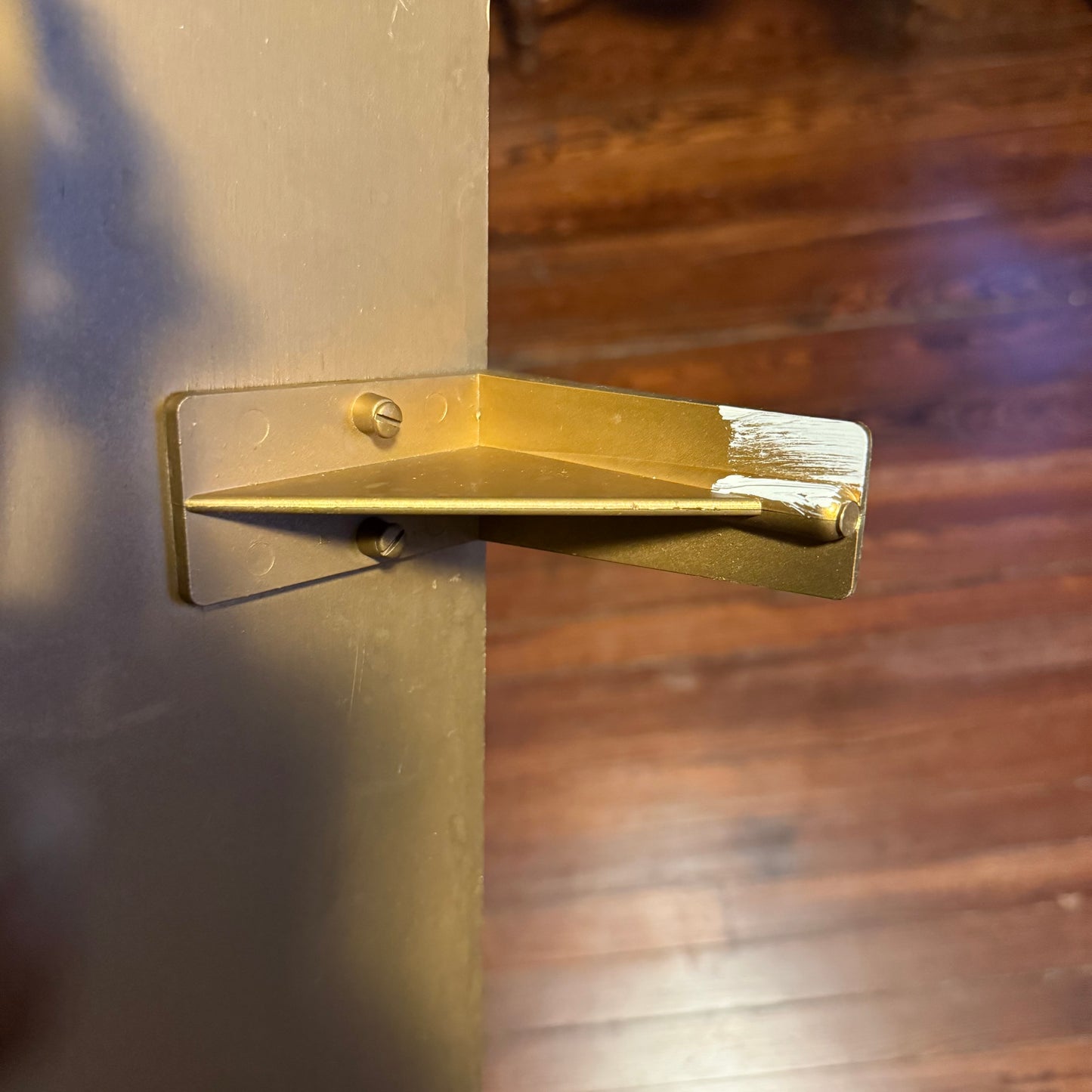 gold floral wall shelf