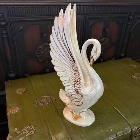 iridescent swan statue
