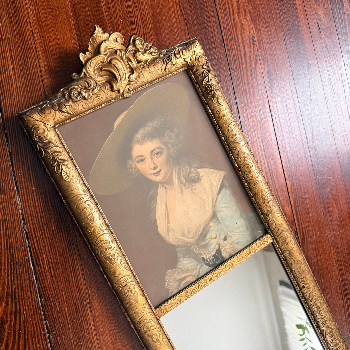 antique wall mirror with lady print