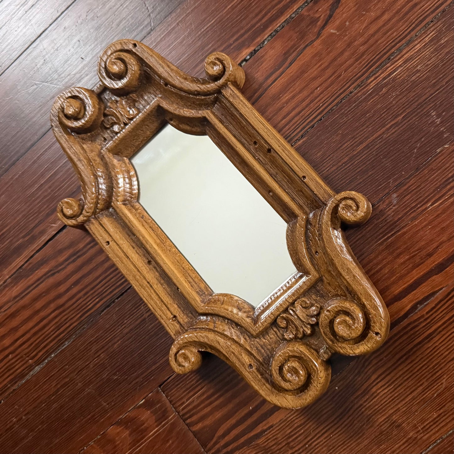 faux wood scroll mirror