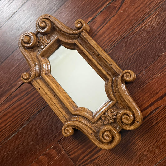 faux wood scroll mirror