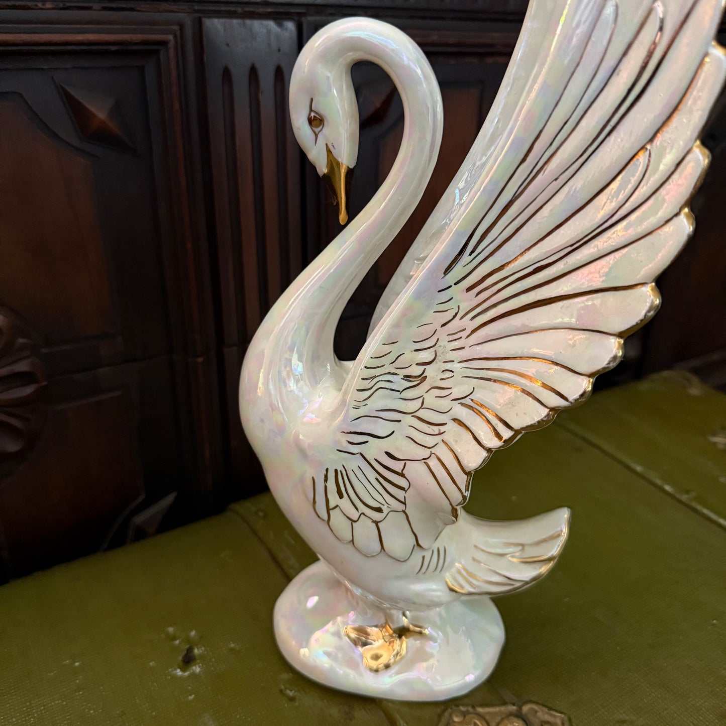 iridescent swan statue