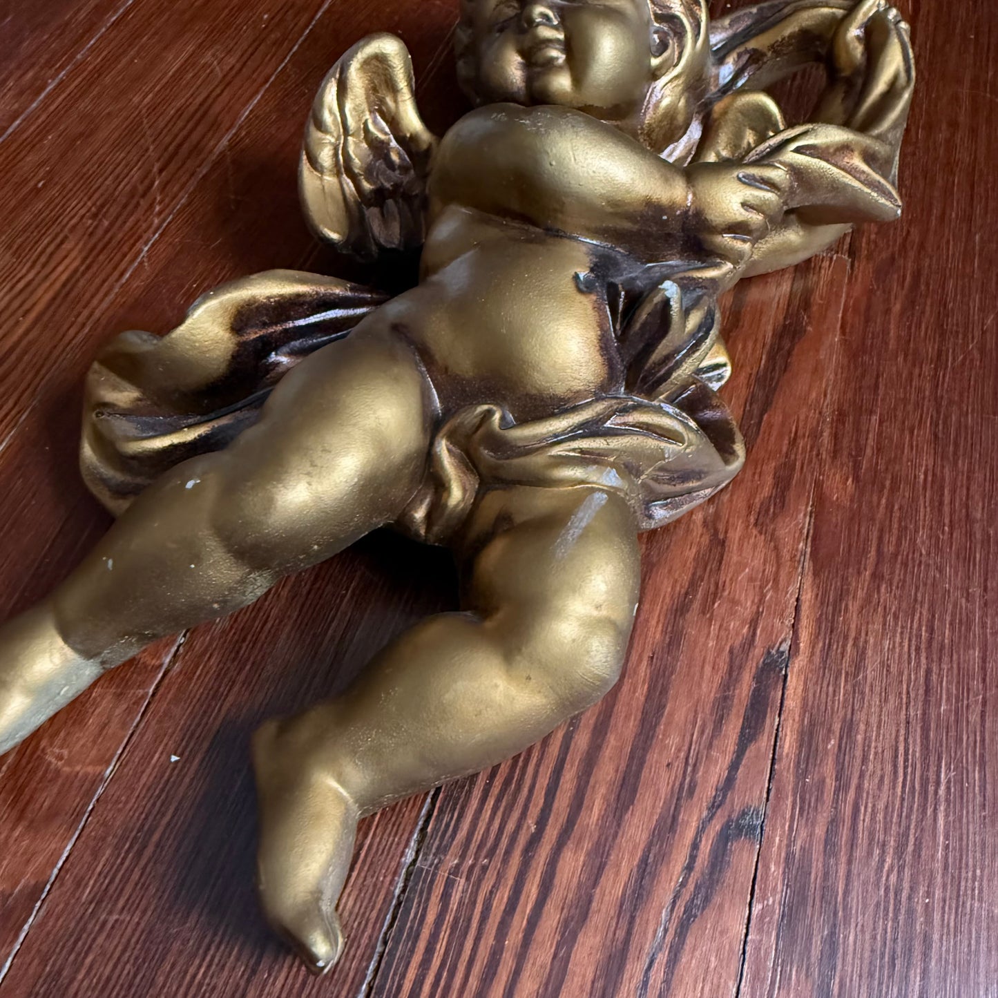 pair of wall hanging cherubs
