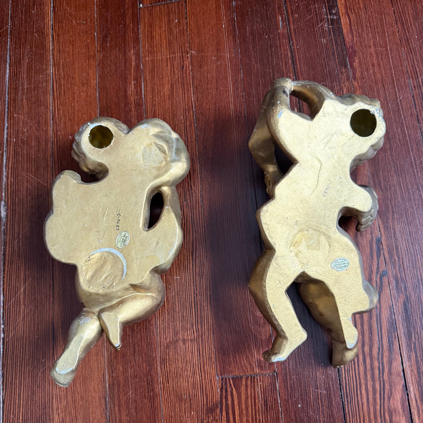 pair of wall hanging cherubs