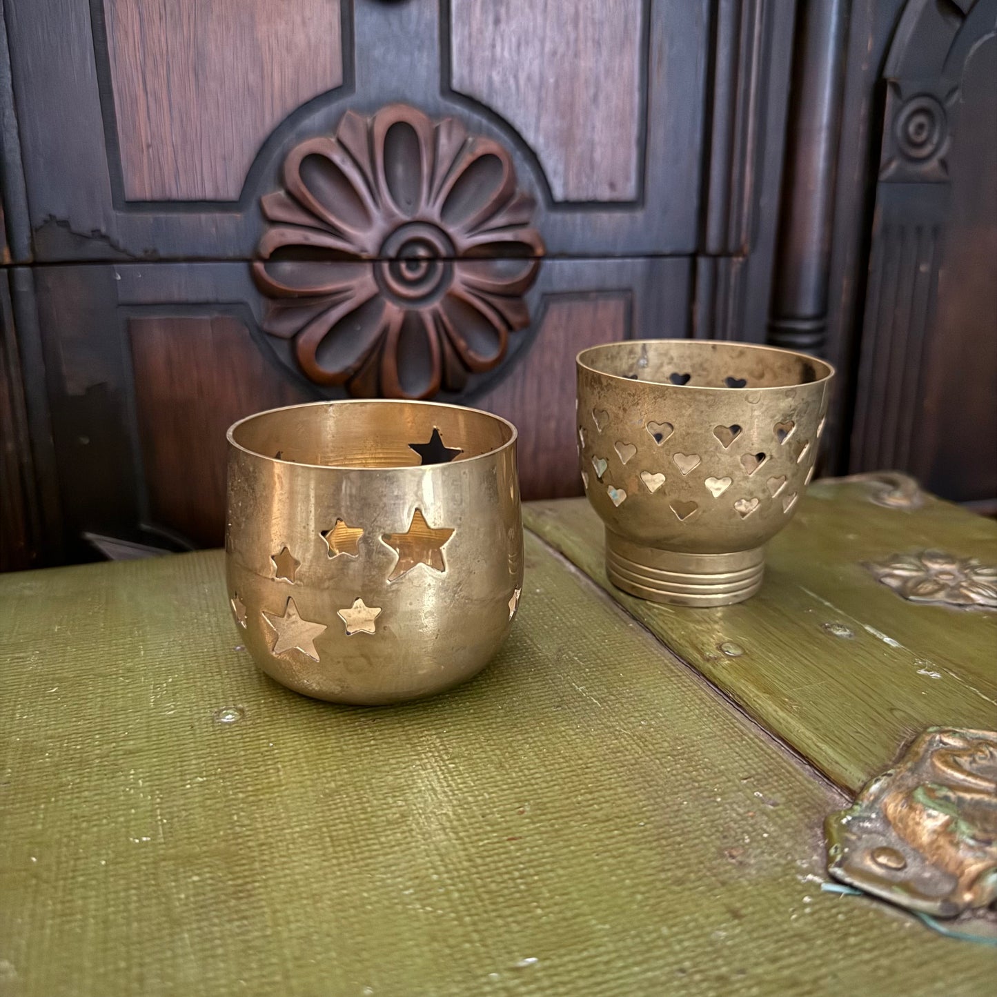 brass star and heart votive holders