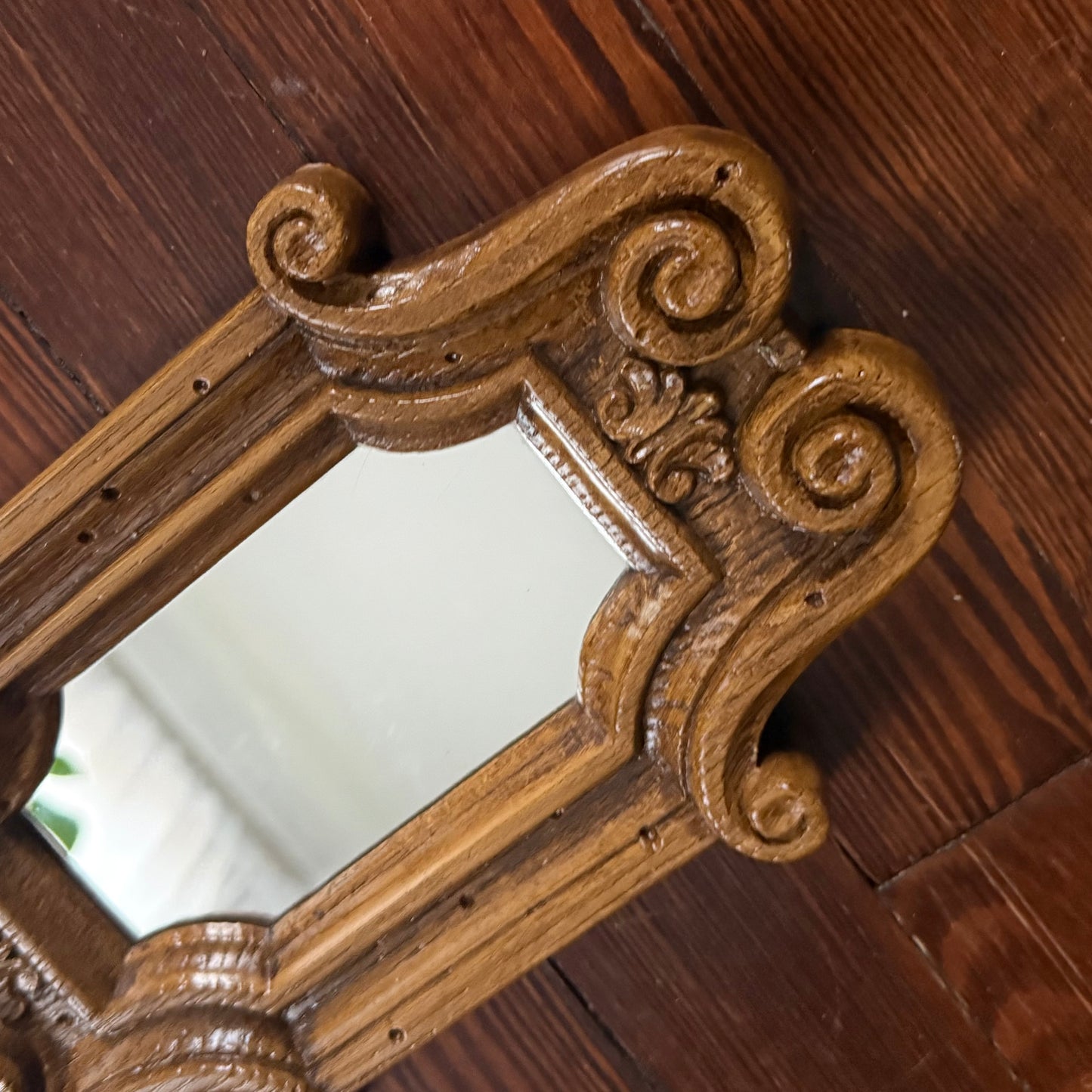 faux wood scroll mirror
