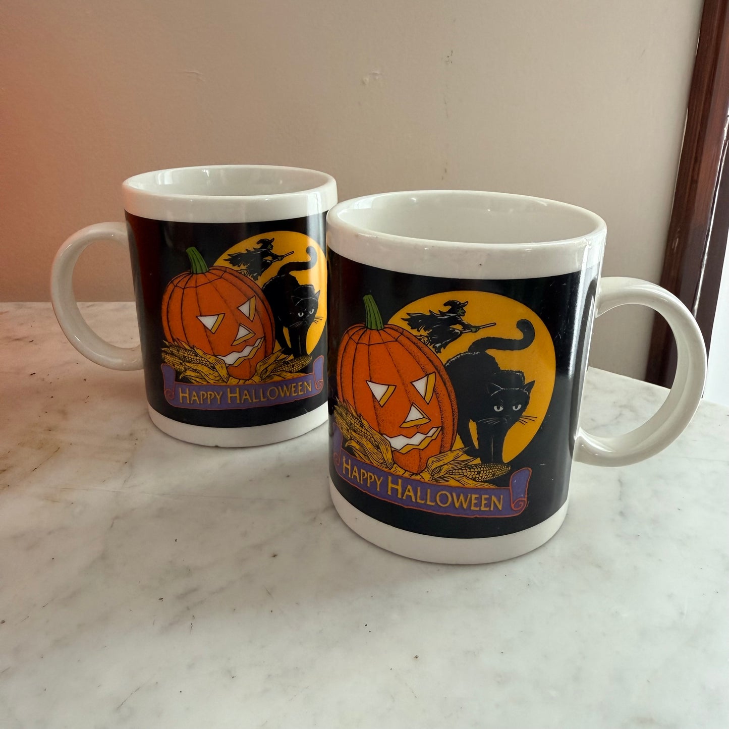 pair of vintage coffee mugs