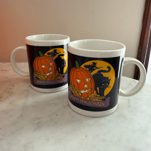 pair of vintage coffee mugs