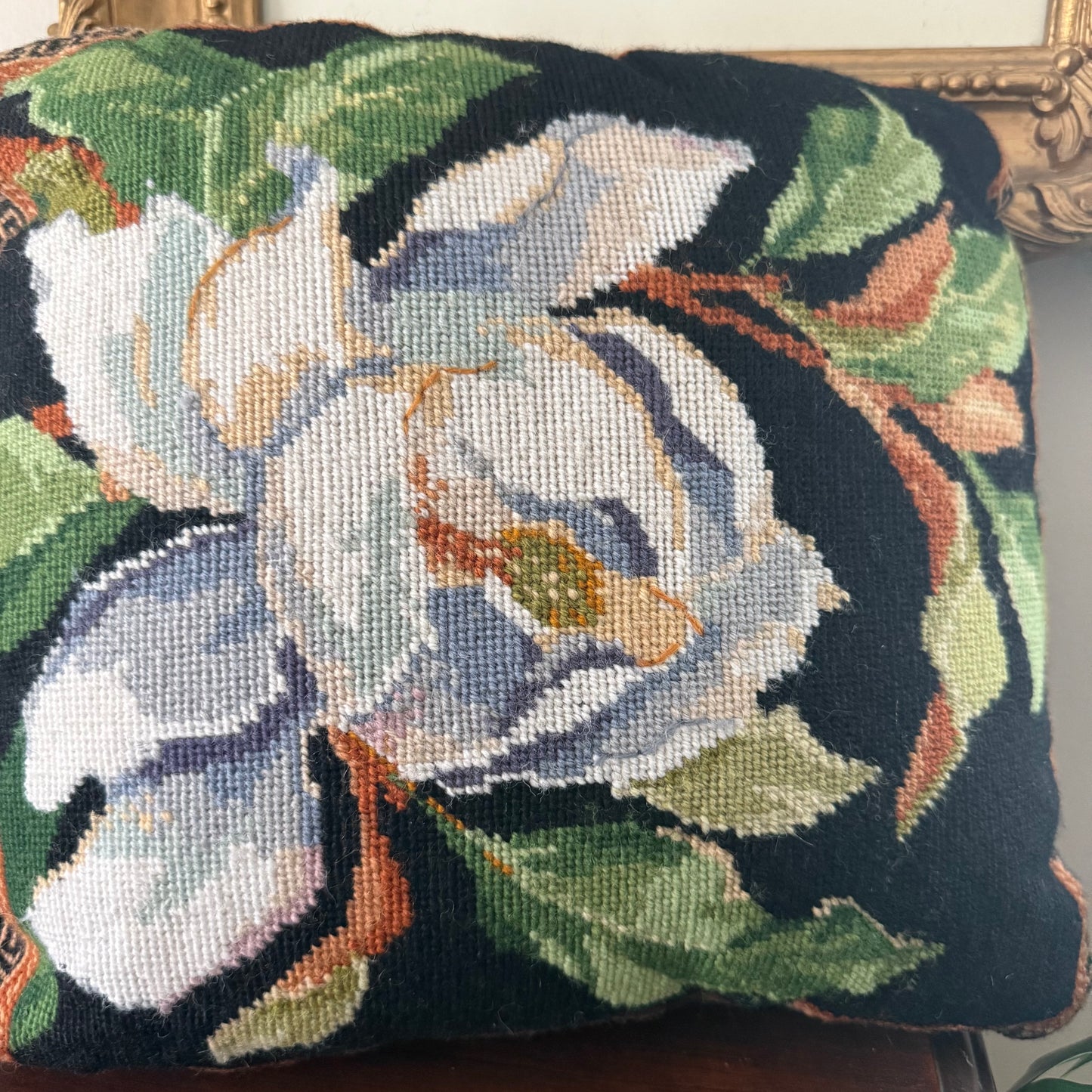 magnolia needlepoint pillow