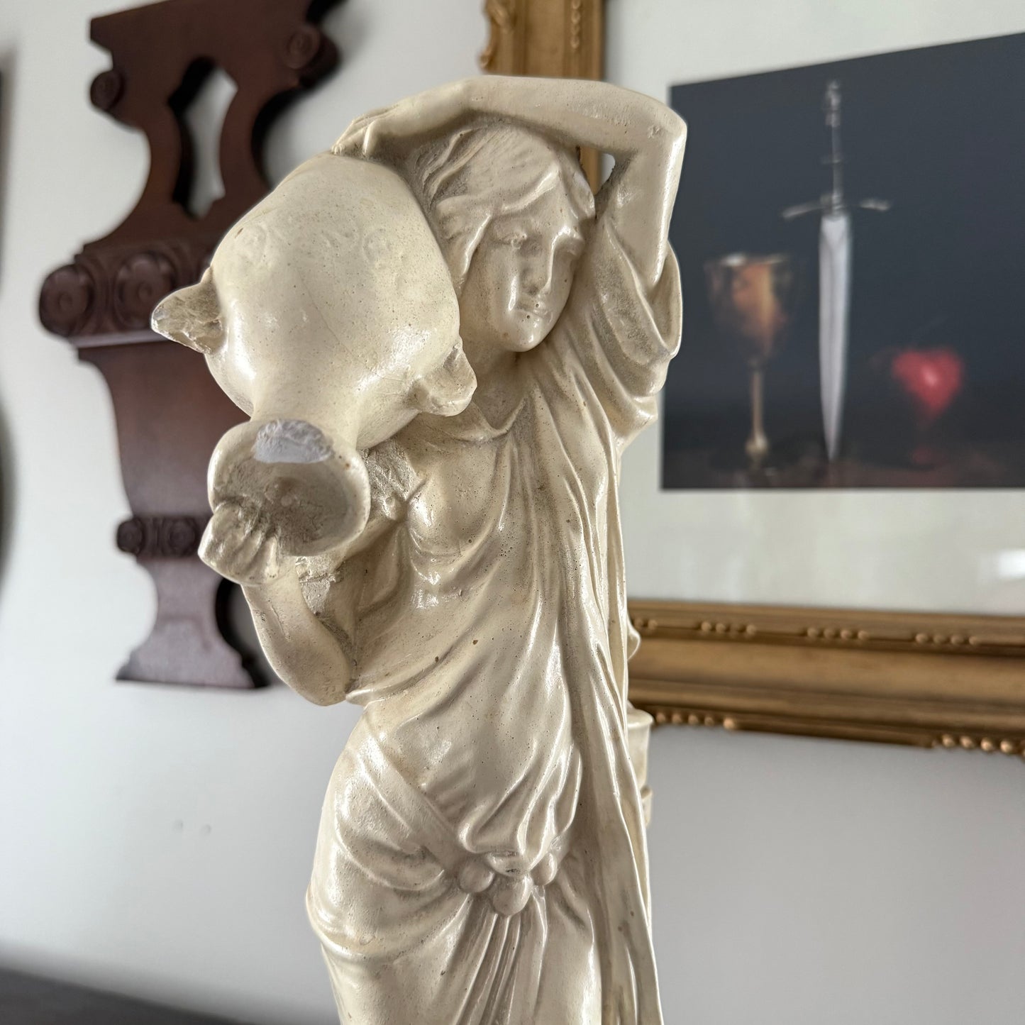 vintage aquarius water bearer statue