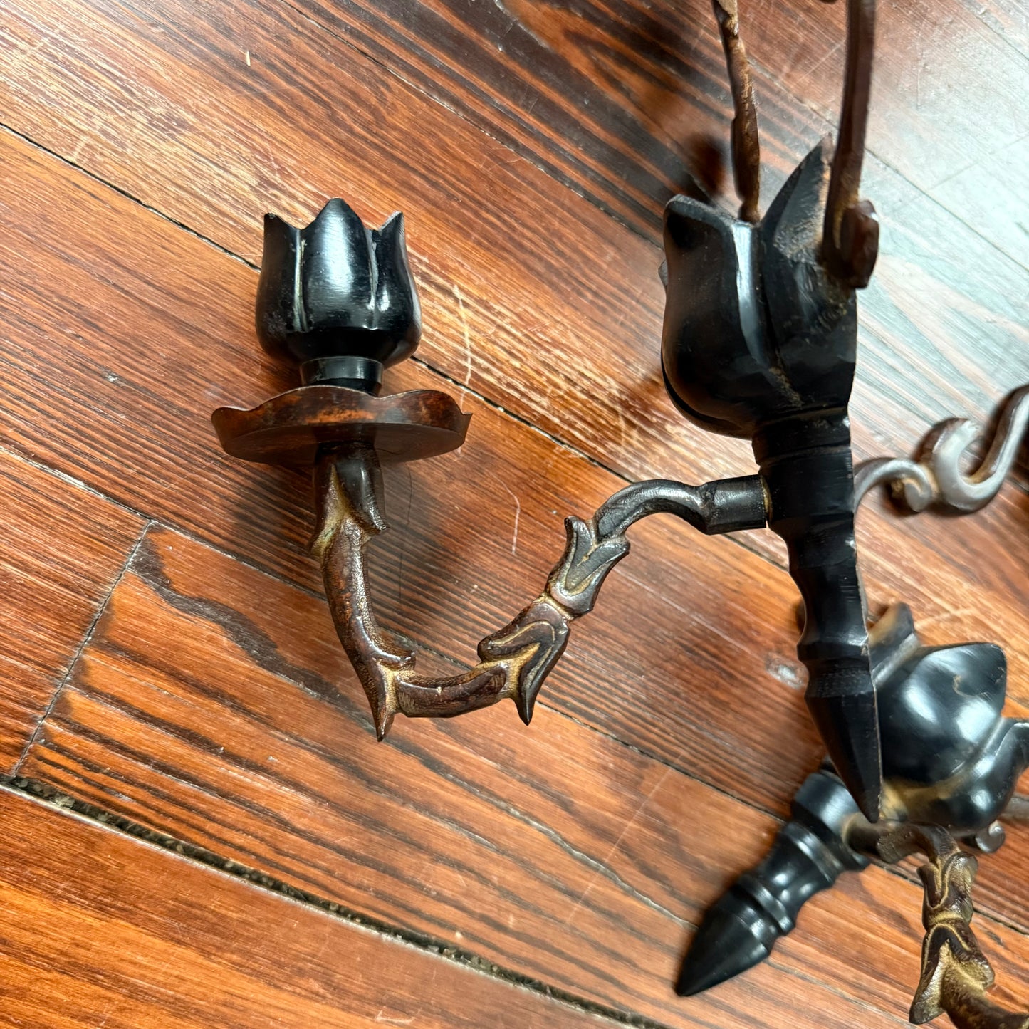 pair of cast iron sconces