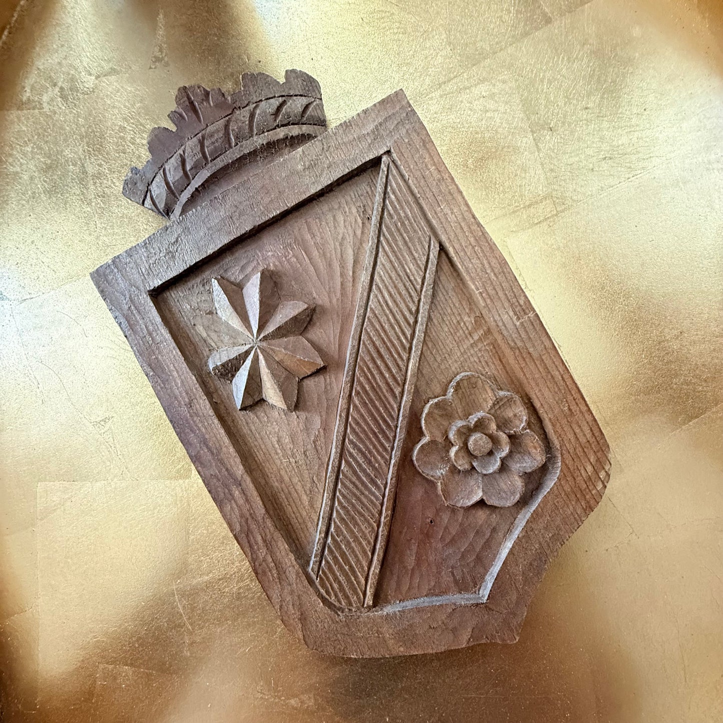 vintage carved wooden crest