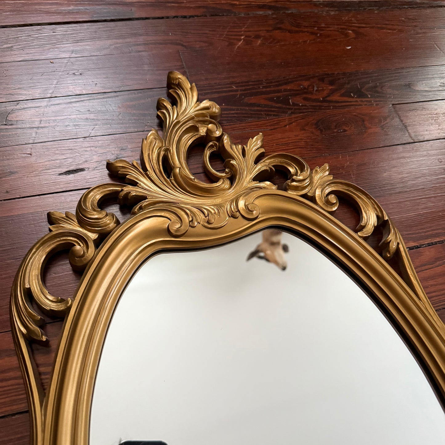 gold rococo style mirror