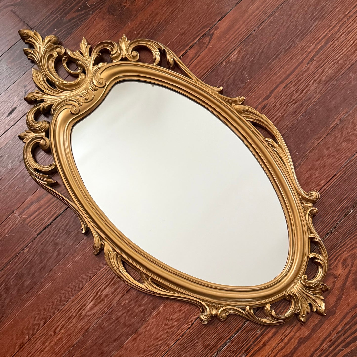 gold rococo style mirror