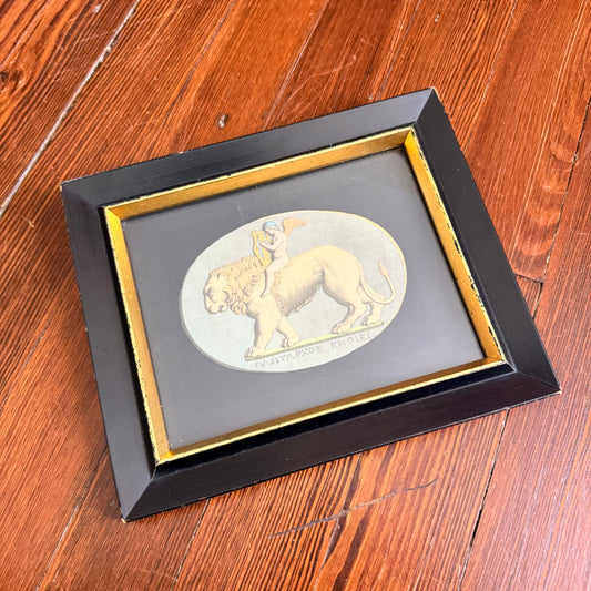 framed cupid and lion litho