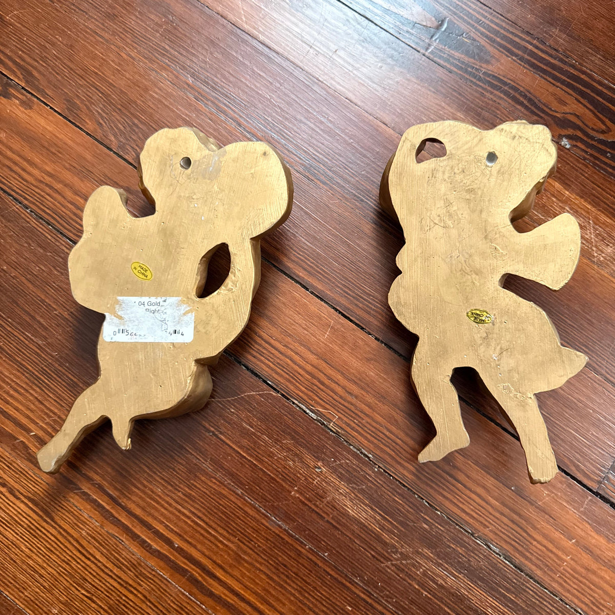 pair of gold cherubs
