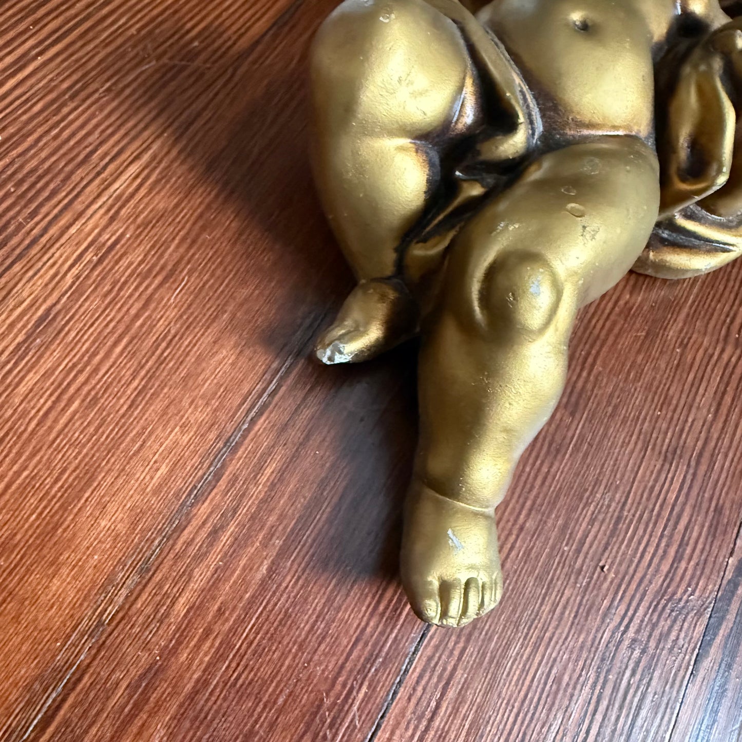 pair of wall hanging cherubs