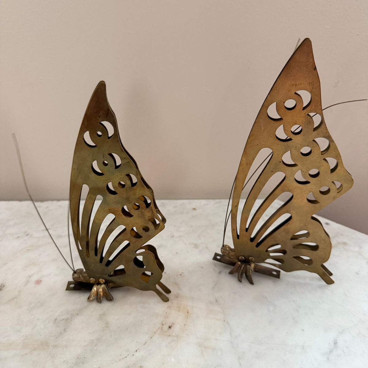 pair of brass butterflies
