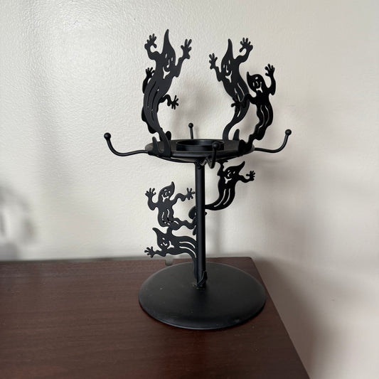 metal glowing ghost candle holder
