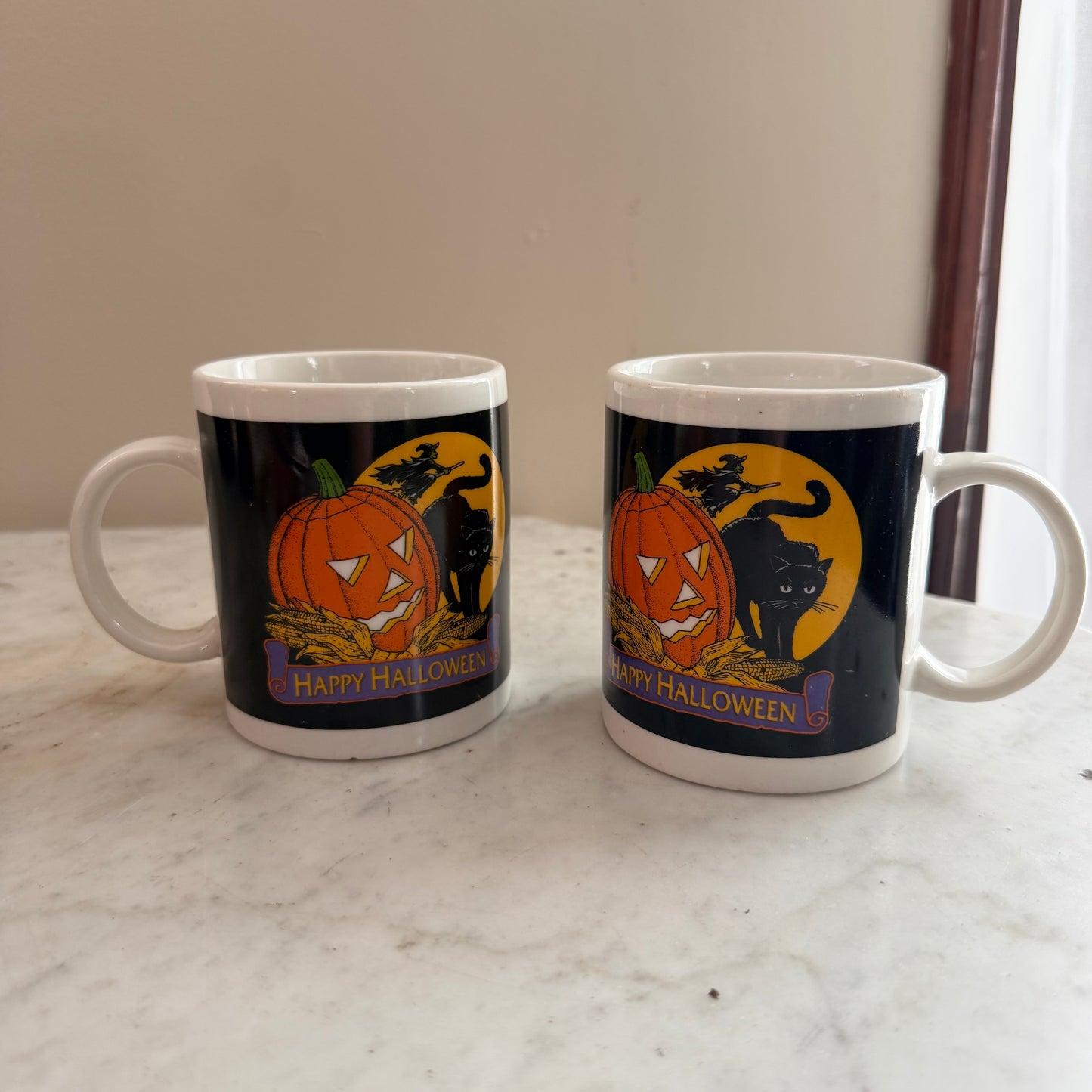 pair of vintage coffee mugs