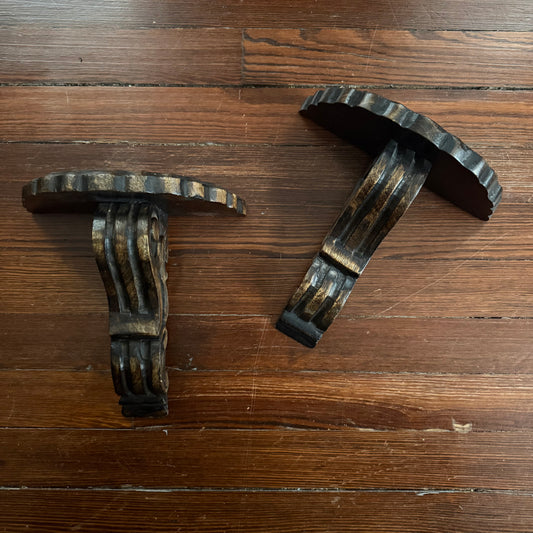 pair of carved wood wall shelves