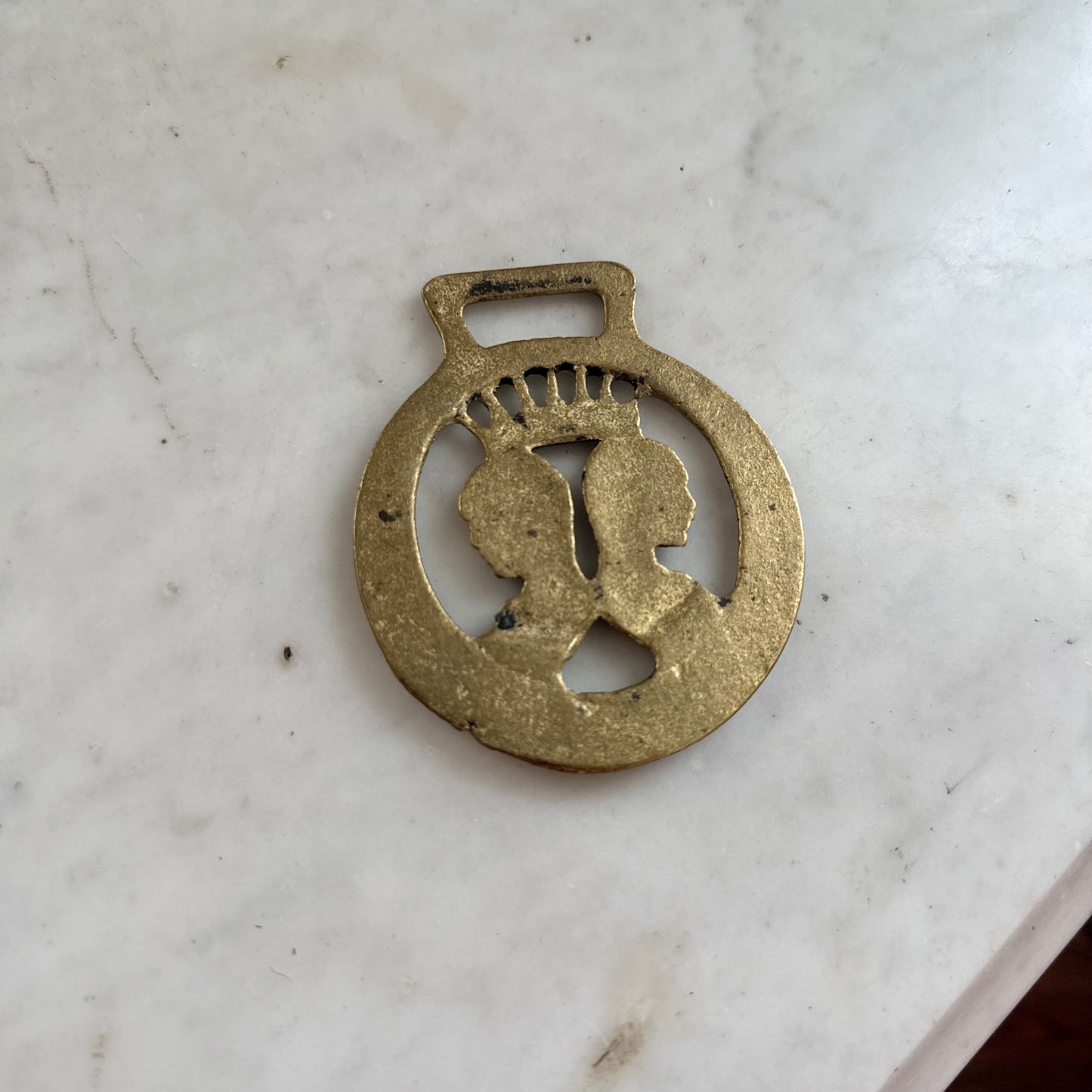 brass gemini medallion